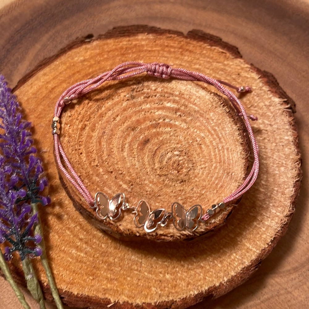 Pretty Lauren Conrad, pink butterfly bracelet brand new